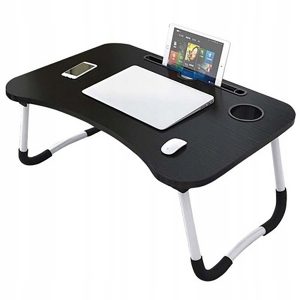 Skládací stolek pod notebook umožňuje pohodlnou práci za všech podmínek. Může být umístěn například i na posteli či stole.